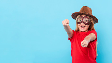Girl driving imaginary airplane