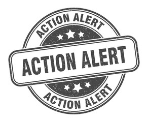 action alert stamp. action alert round grunge sign. label