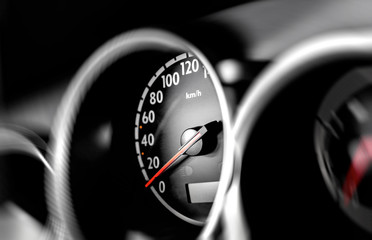 Car speedometer, close up. A device for determining the speed of a car. - obrazy, fototapety, plakaty