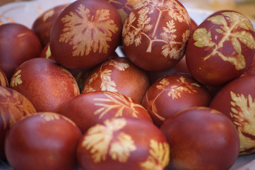 Easter eggs with leaf patterns on the table