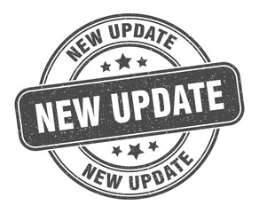 new update stamp. new update label. round grunge sign