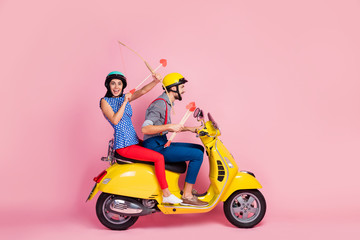 Full length profile side photo crazy two people biker amour motorcyclist riders drive yello0w motor...