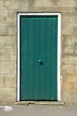 Old green garden door 
