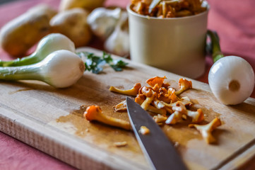 chopped chaterelle mushrooms and vegetables close up