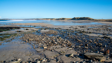 Dunnet Bay tide out on frozen sunny Spring day