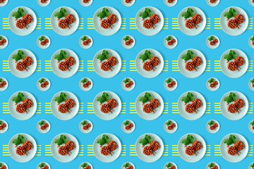 Tasty eastern sweets kozinaki made from peanuts and honey on a blue background.