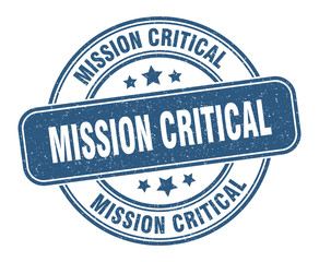 mission critical stamp. mission critical label. round grunge sign