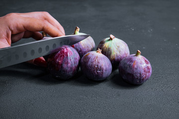 Close-up fresh figs on dark background