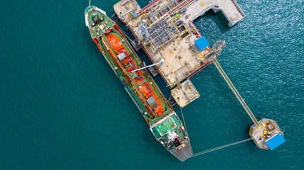 Ship tanker gas LPG, Aerial view Liquefied Petroleum Gas (LPG) tanker, Tanker ship logistic and transportation business oil and gas industry, Loading arm oil and gas offshore platforms.