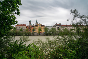 Fototapeta na wymiar Innsbruck in Austria with high water in the Inn river.