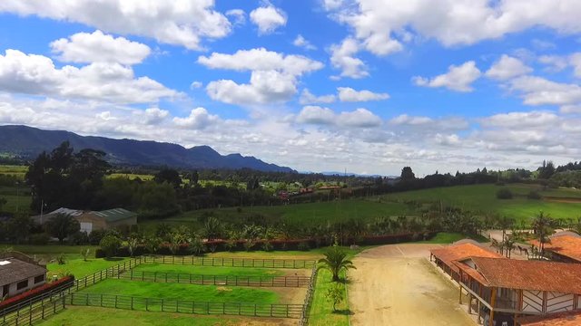 High mountains of mythical figures, trees and a clear sky all in Tabio