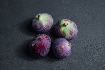 Close-up fresh figs on dark background