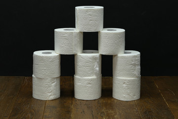 close up of a toilet paper on black background