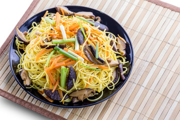 Chiness noodle on black plate