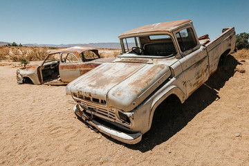 Old abandoned rusty cars in Solitaire, Namibia