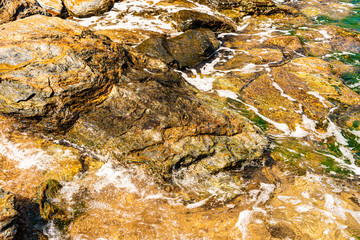Obraz premium Sea rocks washed by the waves