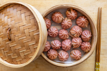 steam basket with pink dim sum