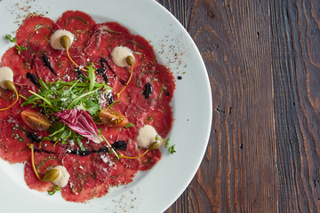 Marbled beef carpaccio. Top view, flat lay