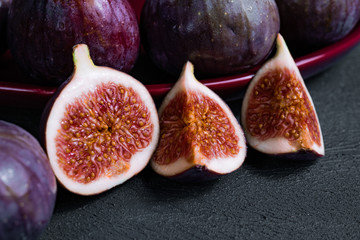 Close-up fresh figs on dark background