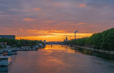 Gennevilliers, France - 05 06 2020: View of the Seine at sunrise from Clichy Bridge