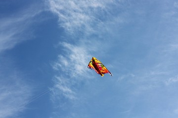 Fototapeta na wymiar Beautiful view multicolored kite in the sky