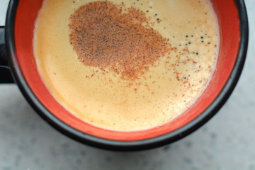 A coffee with cinnamon powder. Fragrant Brazilian Coffee