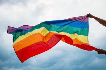 Rainblow flag blown into the sky. LGBT. Gay flag. 