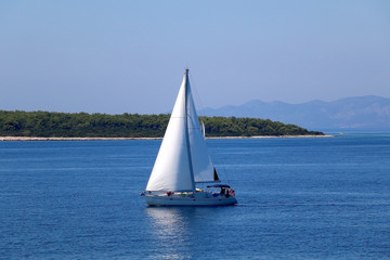 Obraz premium Sailing boat on the sea in southern Dalmatia region in Croatia. Beautiful landscape and bright summer day.