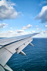 Fototapeta na wymiar Sea and sky seen from an airplane. 