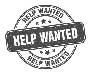 help wanted stamp. help wanted label. round grunge sign