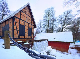 A photo of a watermill in Marieholm, Sweden during winter season
