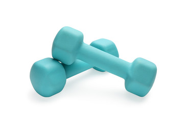 Two turquoise colored rubber dumbbells lying at white table