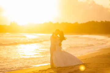 Fototapeta na wymiar Wedding romantic couple on the beach in Dominican republic, Punta Cana 