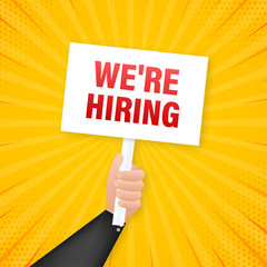 We're hiring. Cartoon poster with hand holding placard for banner design. Banner, Billboard design. Vector stock illustration