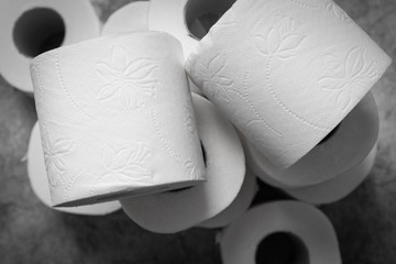 Stocks of many rolls of toilet paper at home.