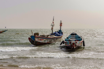 Naklejka na ściany i meble Colorful fishing boat in Banjul,