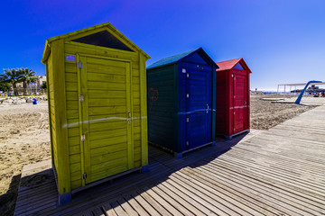 Colored huts on the beach of Villajoyosa, Alicante, Spain