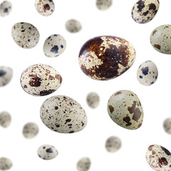 Quail Eggs Flying in Air on White Background. Small Colorful Eggs Falling