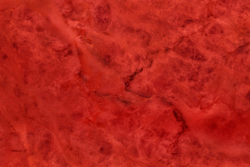 Dark red marble texture background with high resolution for interior decoration. Tile stone floor in natural pattern.