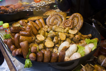 Traditional grill sausages at Christmas and New Year's fair in Kyiv, Ukraine