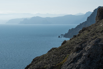 Beach. High cliffs. No people. 