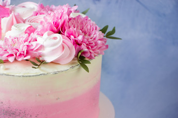 Pink cake. Meringues and pink flowers on the top of cake . Concept for Wedding , St. Valentine's Day, Mother's Day, Birthday Cake. Baking cake  template