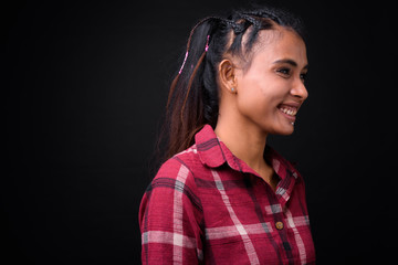 Portrait of young beautiful Asian hipster woman