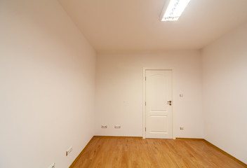 Empty room. New home interior. Wooden floor.