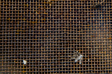 dark texture of rusty metal old dirty mesh