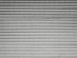 Obraz premium White old metal industrial blinds fragment, ventilation grille.