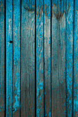 textured boards faded and peeling in the sun