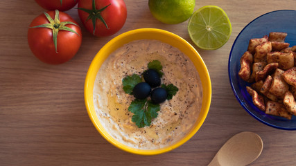 tuna sauce and some ingredients around on the table 