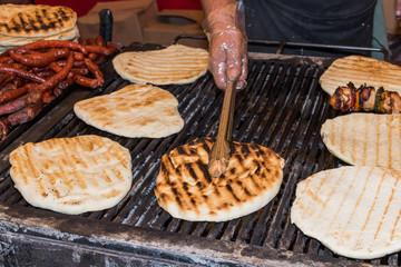 Pita bread on the grill during fast food festival, street food
