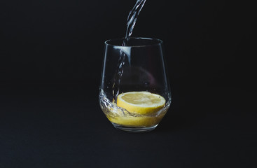 Gin tonic isolated on black background